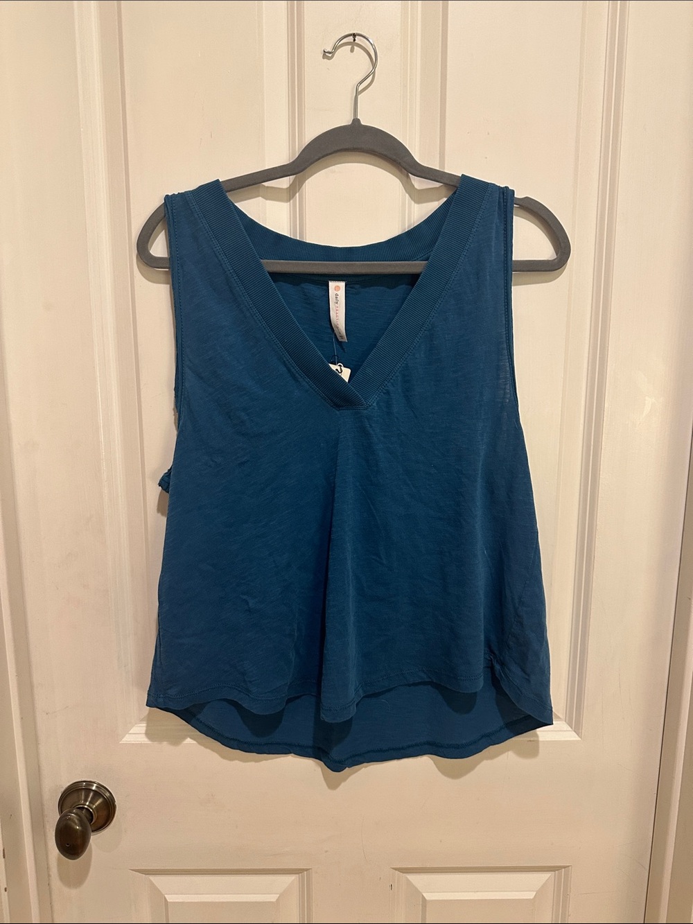 DAILY PRACTICE BLUE SLEEVELESS SHIRT